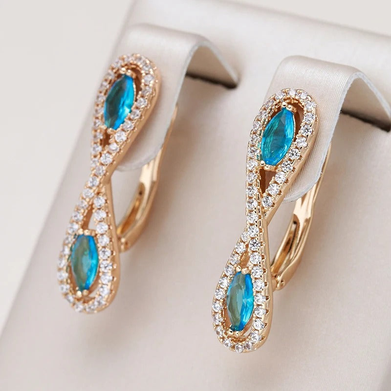 18K Rose Gold plated Aquamarine Crystal Infinity Earrings - ZAR