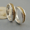 Handmade ring in 925 silver with 18k gold plated threads