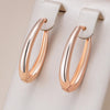 Trendy shiny hoop earrings in 18K Rose Gold Plating