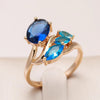 18K Rose Gold plated ring with sapphire and aquamarine crystals inlaid - ZAR