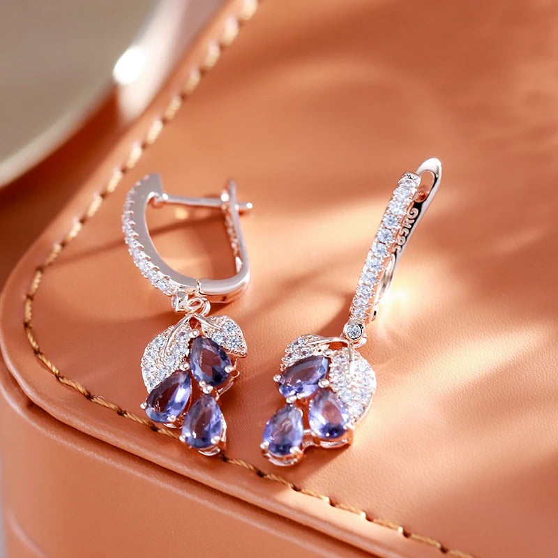 Luxurious 18K rose gold plated dangling earrings with purple cubic zirconia stones - AC