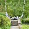 Handmade necklace from the bird family